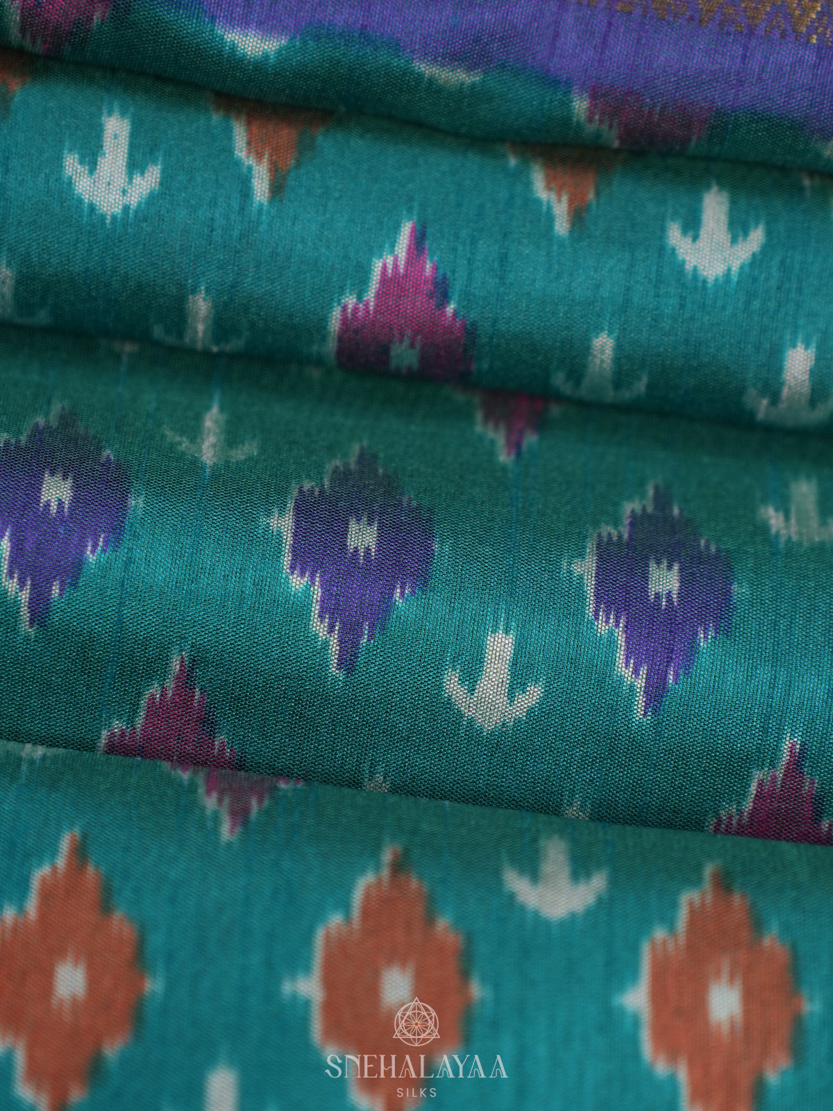 Teal Green Ikat Saree