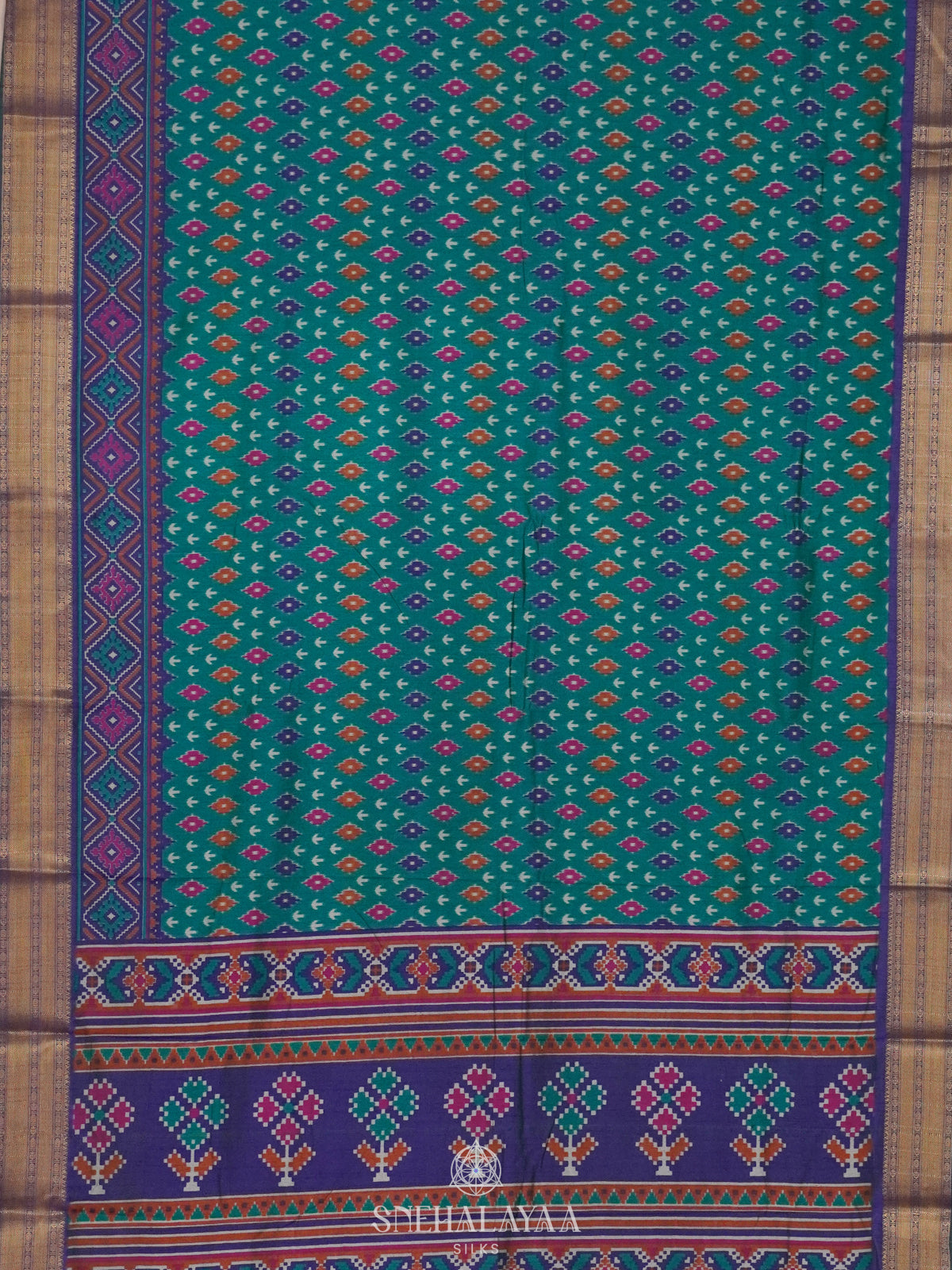 Teal Green Ikat Saree