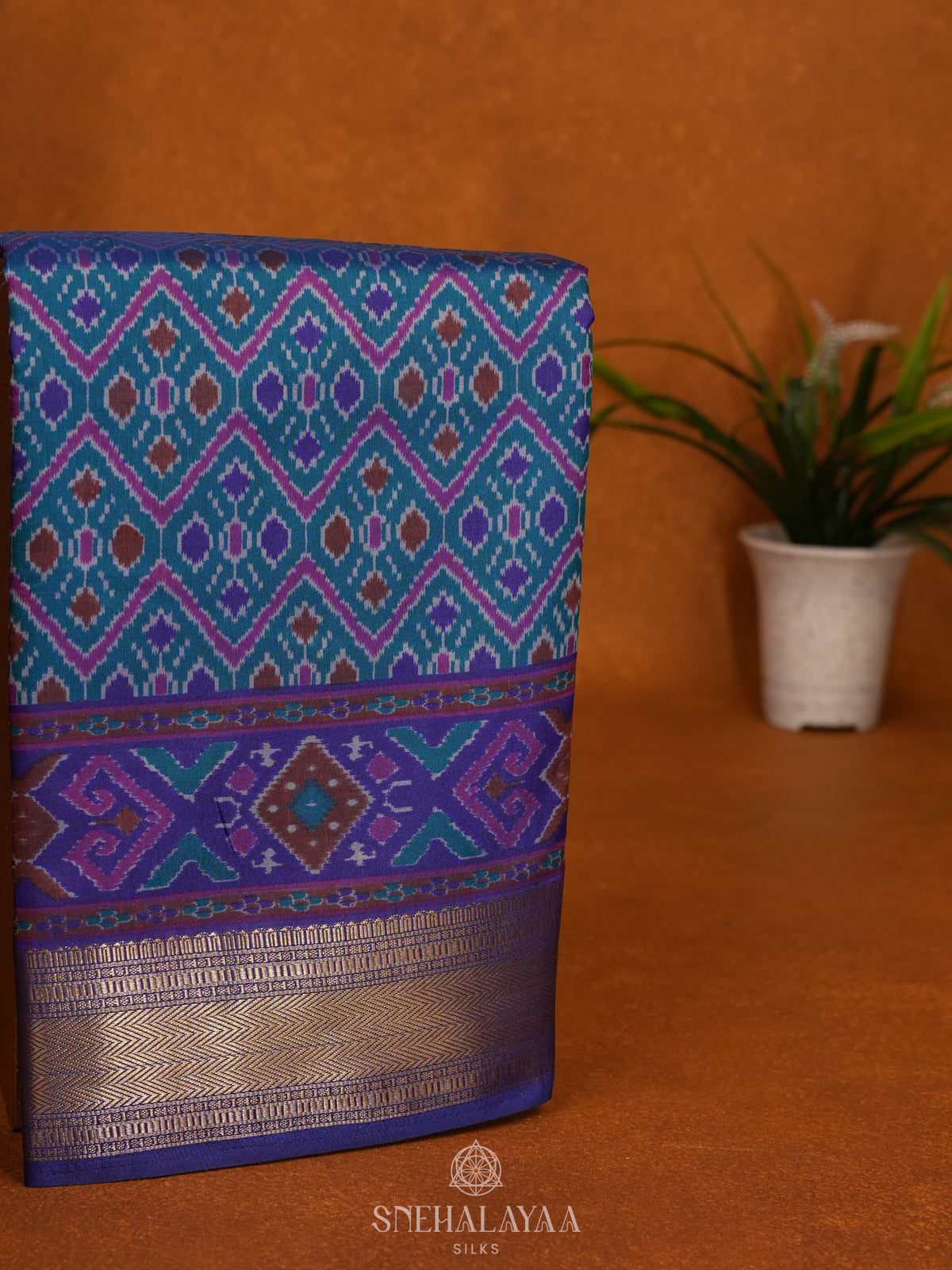 Teal Green Ikat Saree