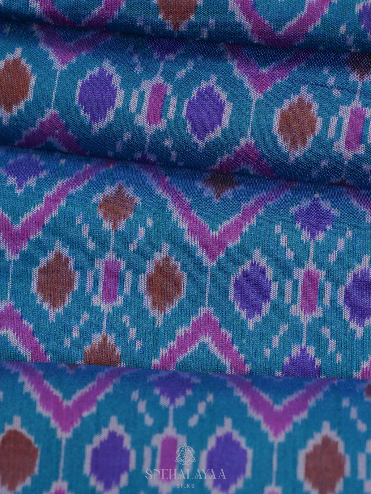 Teal Green Ikat Saree