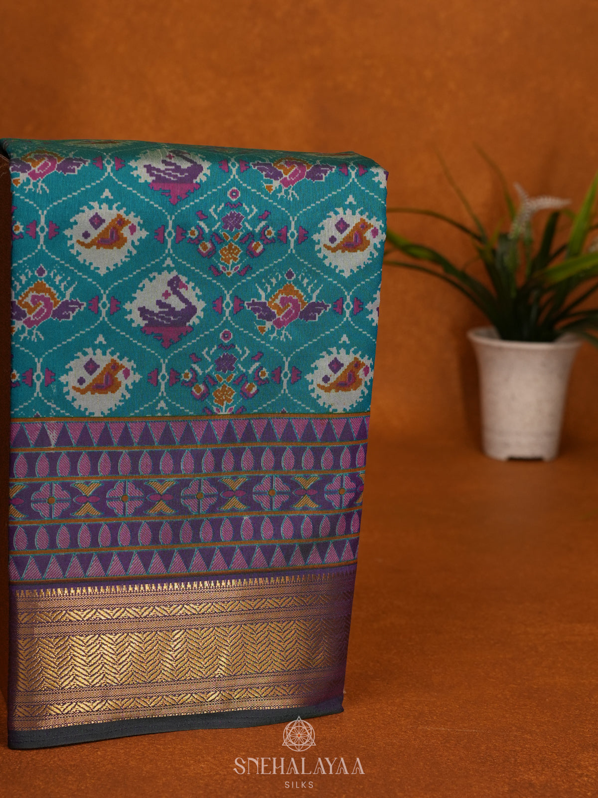Teal Green Ikat Saree