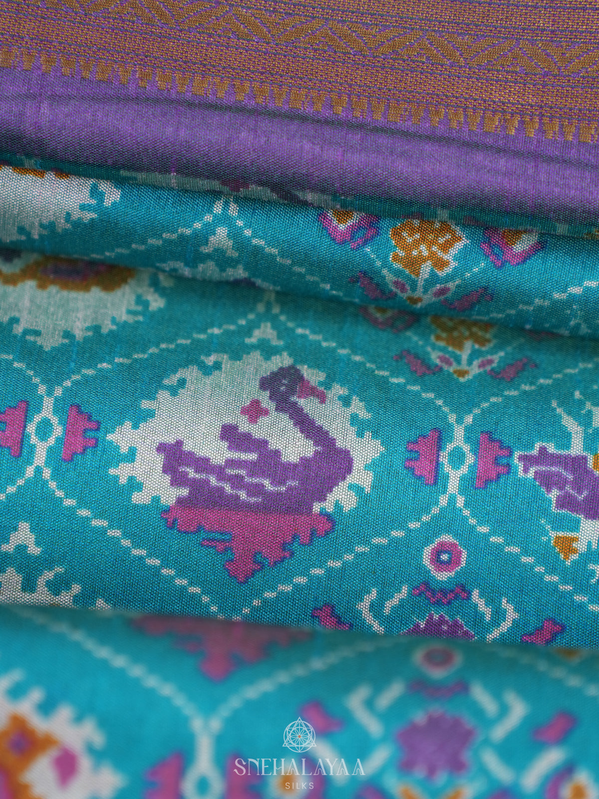 Teal Green Ikat Saree