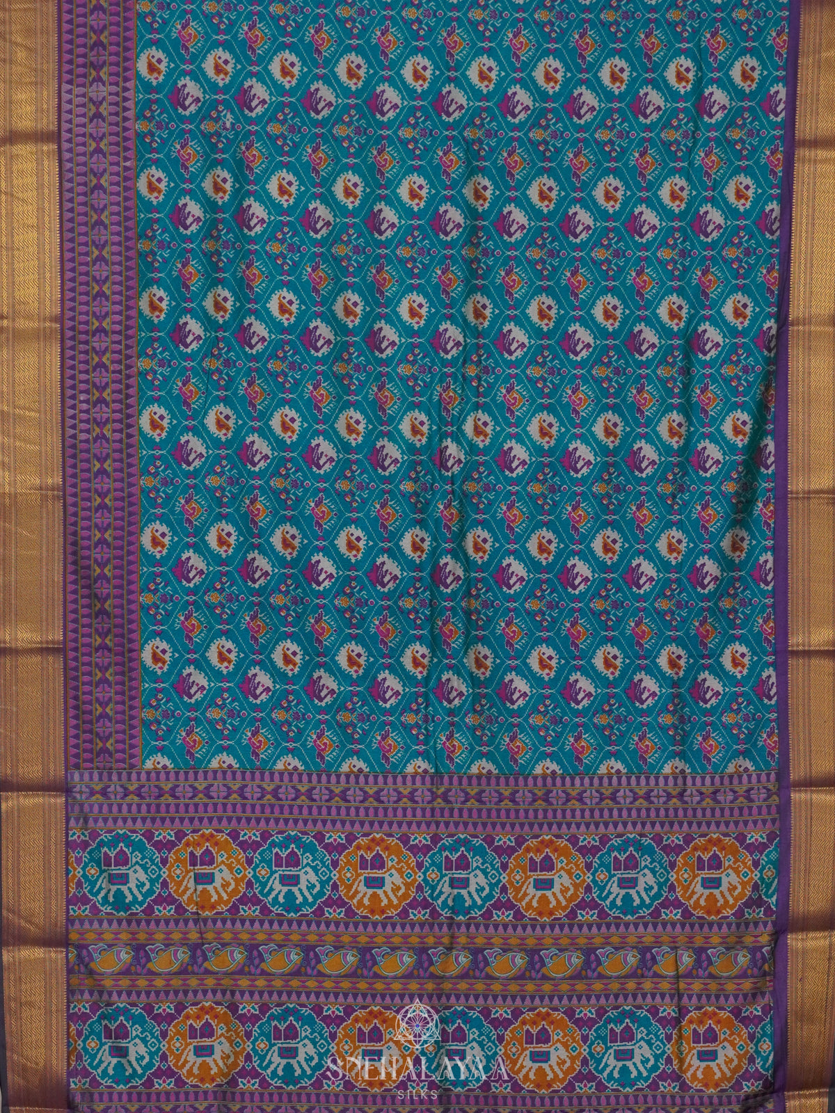 Teal Green Ikat Saree
