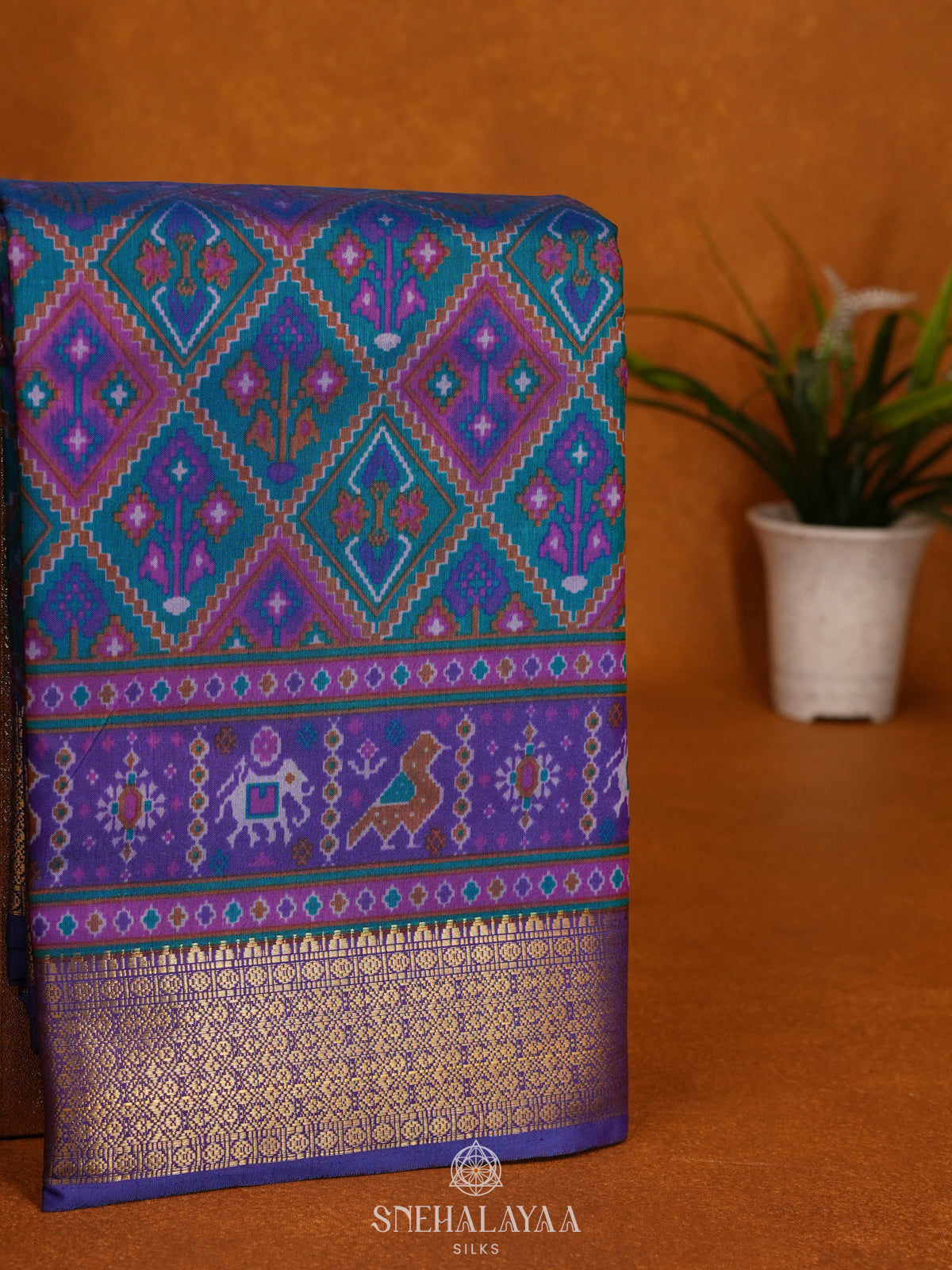 Teal Blue Ikat Saree