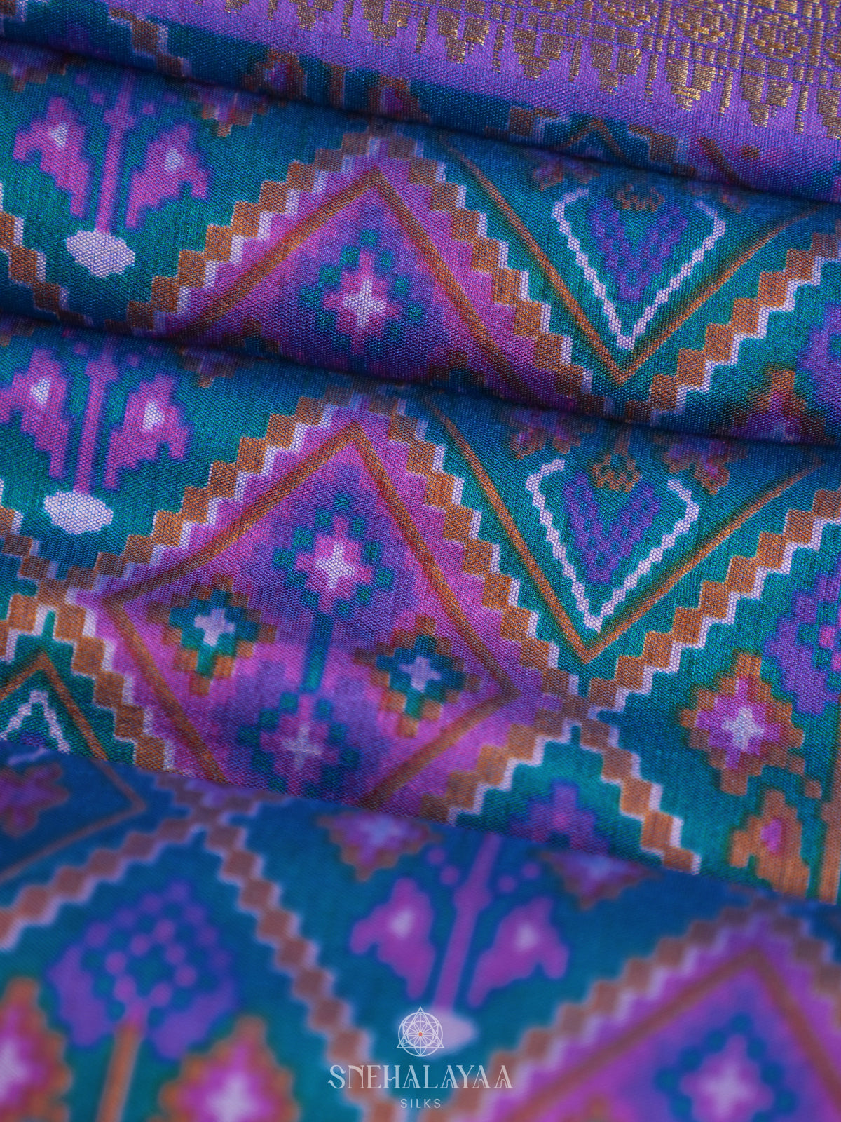 Teal Blue Ikat Saree