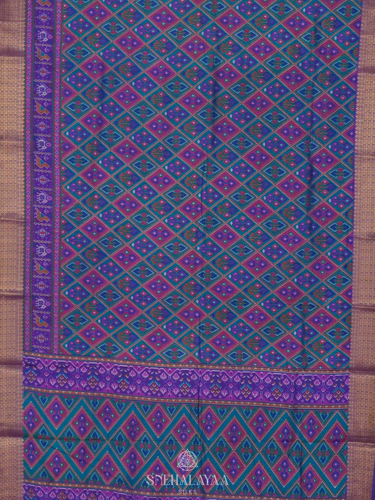 Teal Blue Ikat Saree