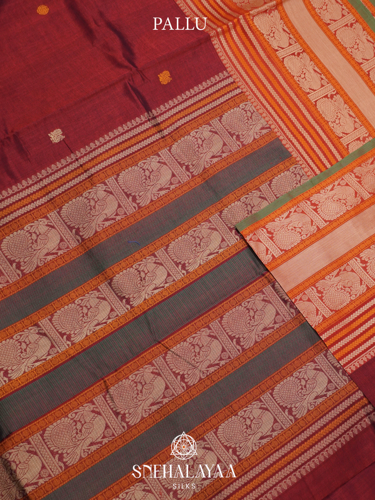 Maroon Kanchi Silk Cotton Saree with Peacock Border