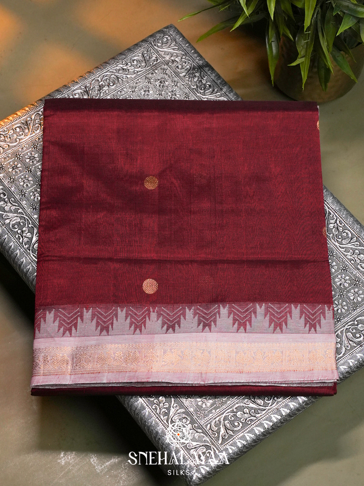 Maroon Kanchi Silk Cotton Saree with Silver-White Temple Border and Gold Buttas