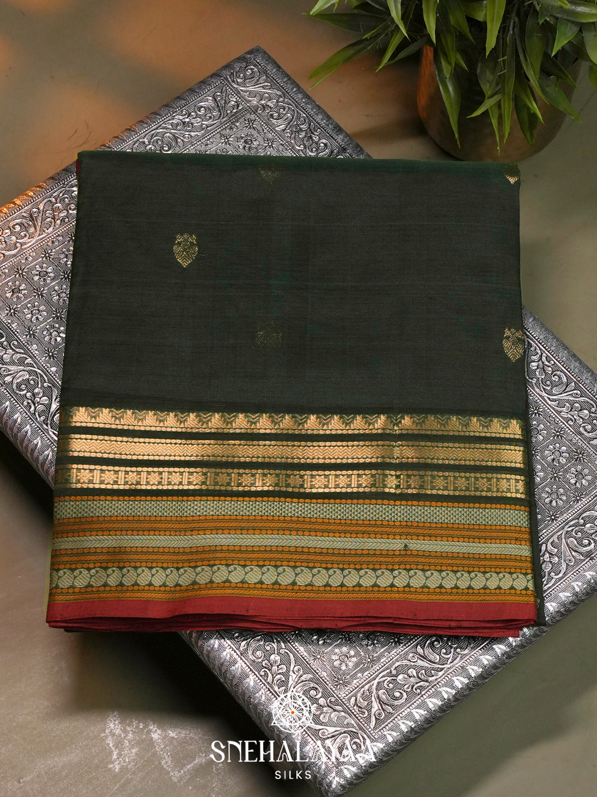 Bottle Green Kanchi Silk Cotton Saree with Multicolored Contrast Border and Gold Leaf Buttas
