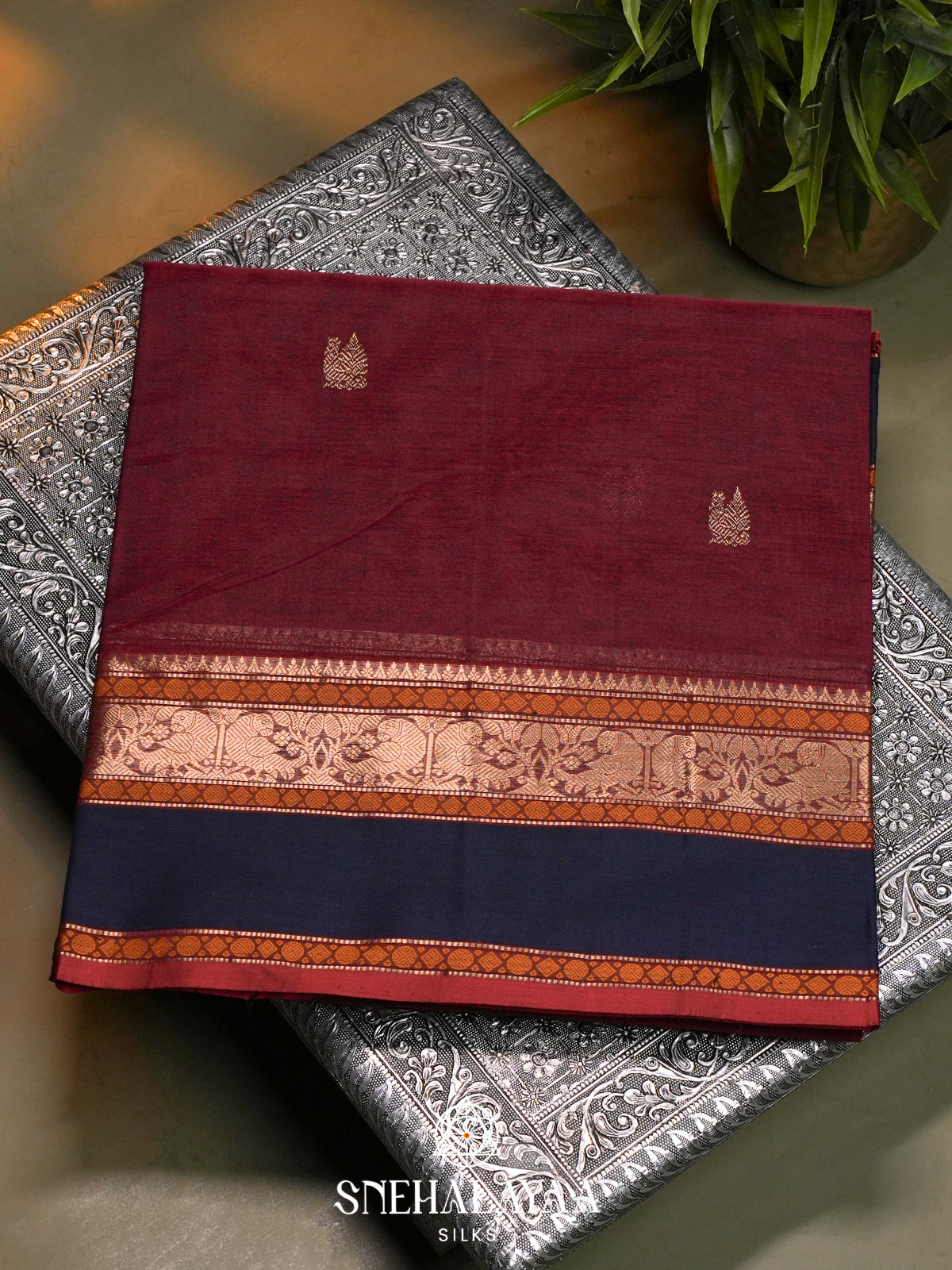 Maroon Kanchi Silk Cotton Saree with Golden-Bronze Elephant-Peacock Border and Navy Blue Contrast Border