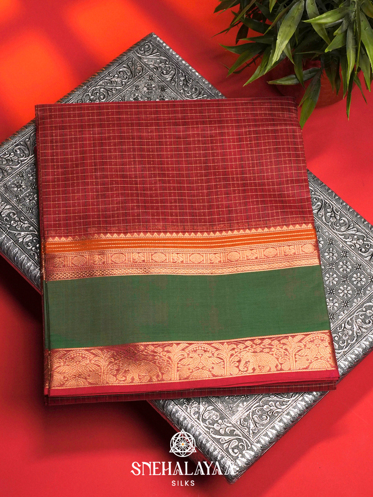 Maroon Silk Cotton Saree with Green Elephant Zari Border