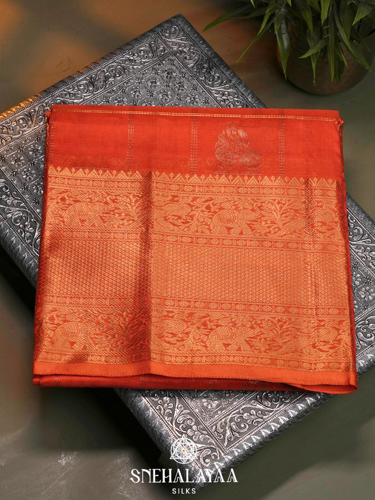 Rust Orange Kuppadam Silk Cotton Saree with Elephant Zari Border