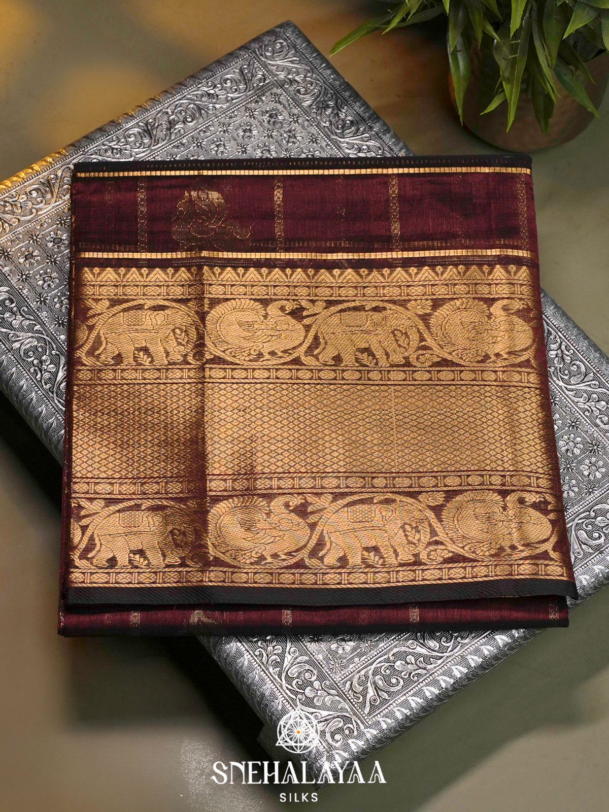 Maroon Kuppadam Silk Cotton Saree with Elephant Zari Border