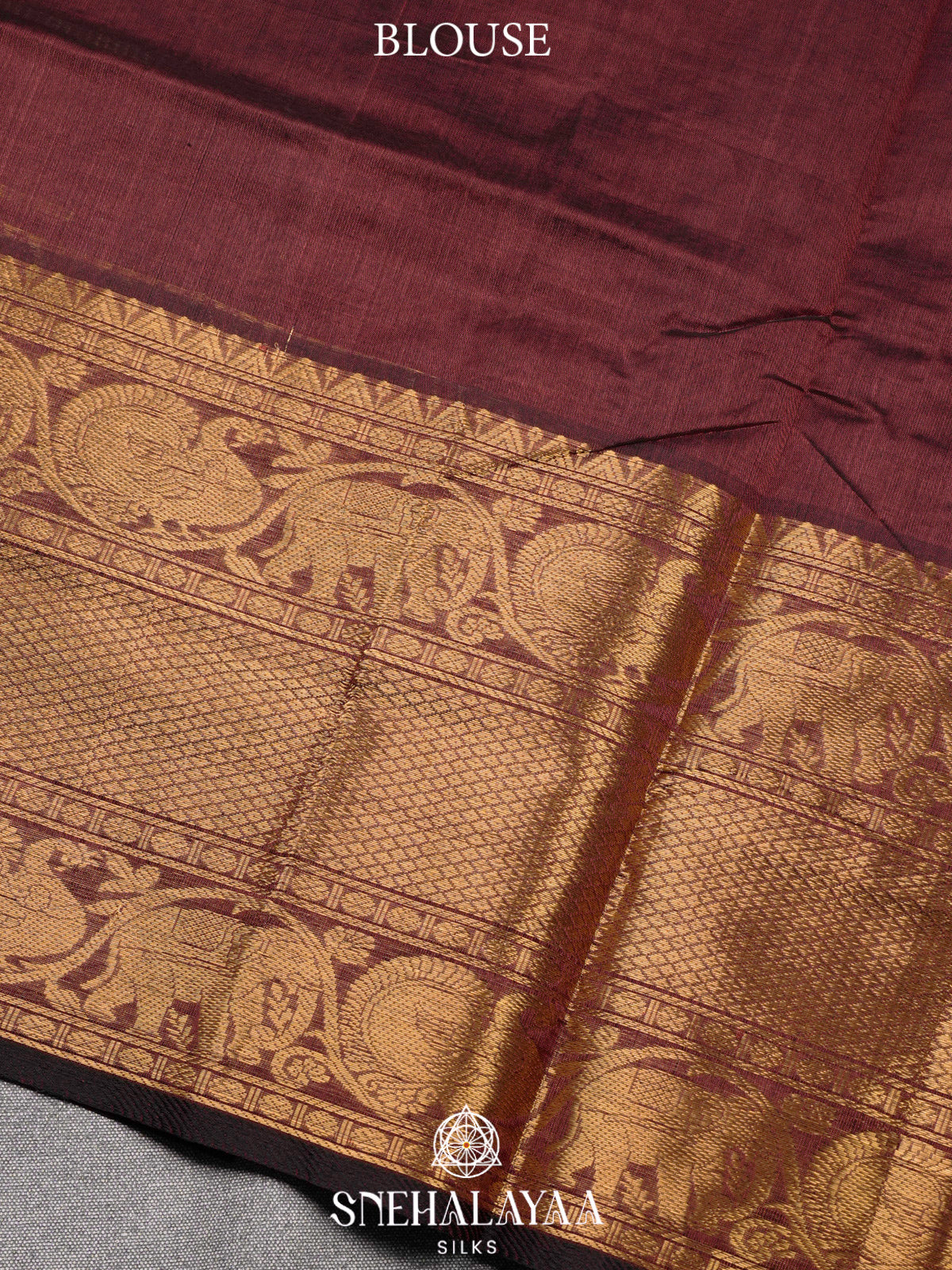 Maroon Kuppadam Silk Cotton Saree with Elephant Zari Border