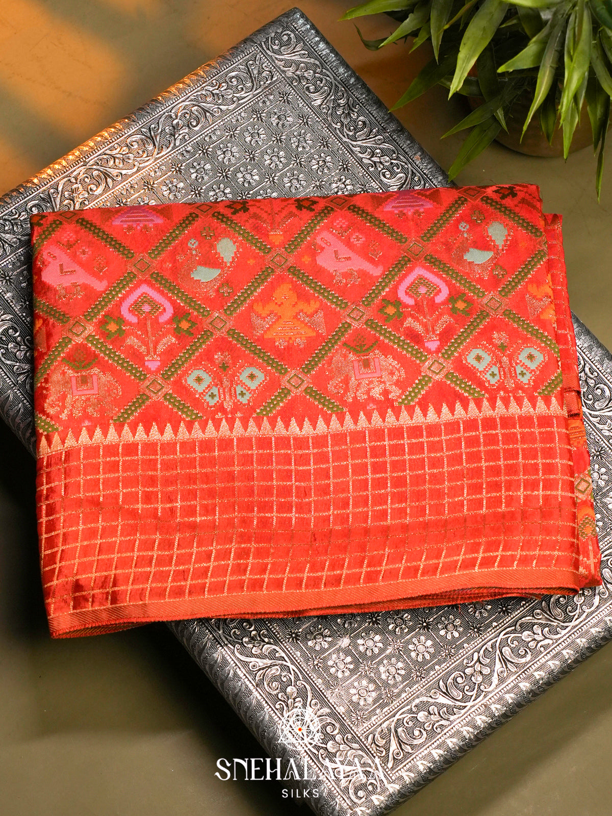 Bright Orange Semi Pochampally Saree with Multicolour Traditional Ikkat Weave