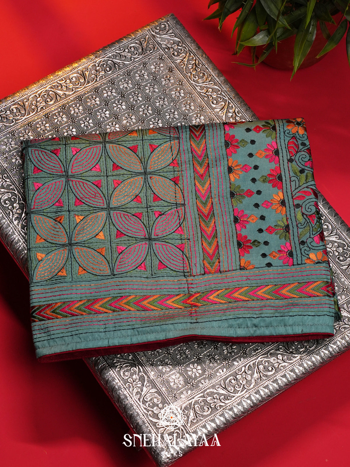 Teal Green Raw Silk Saree