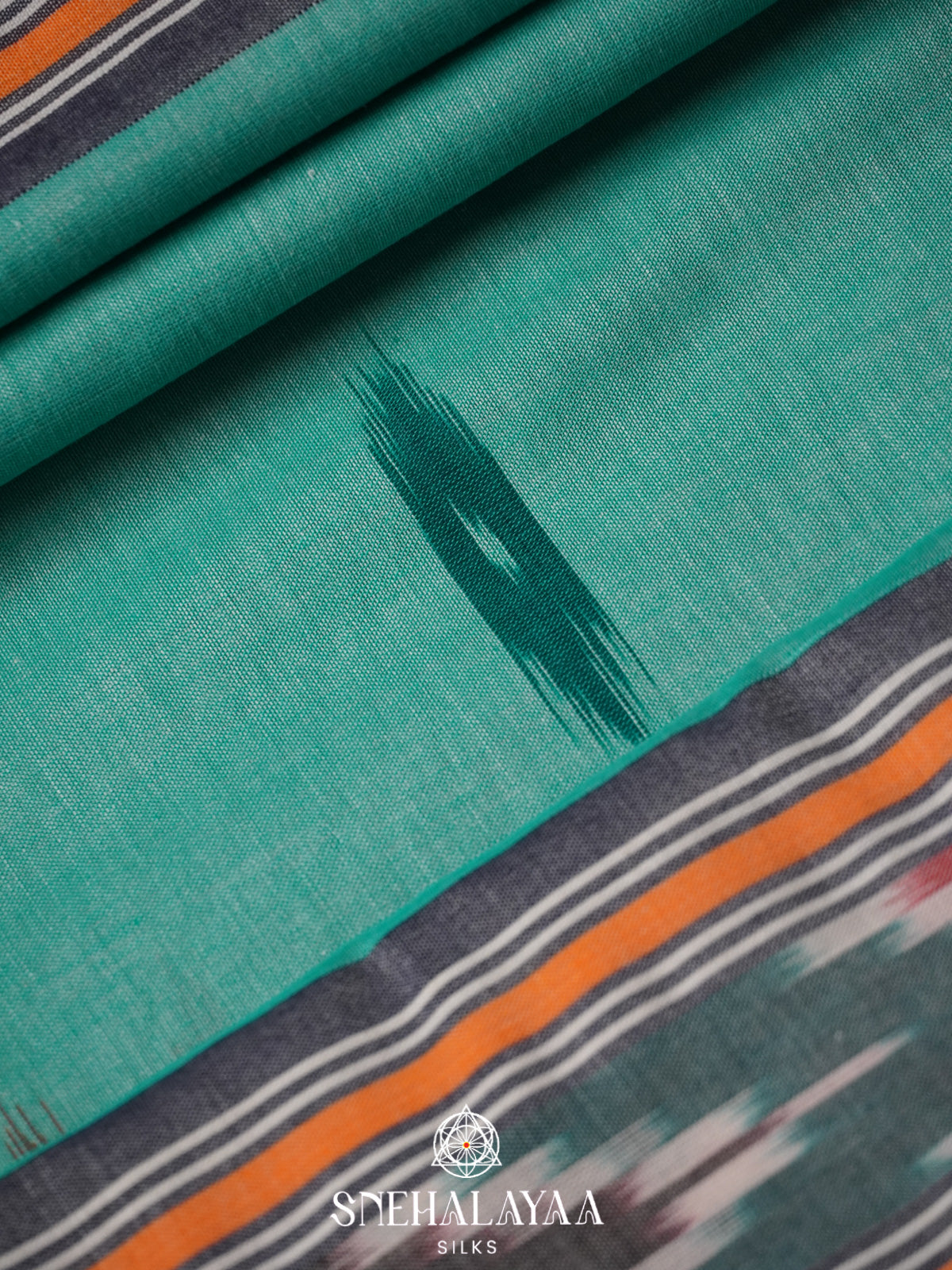 Teal Green Ikkat Cotton Saree