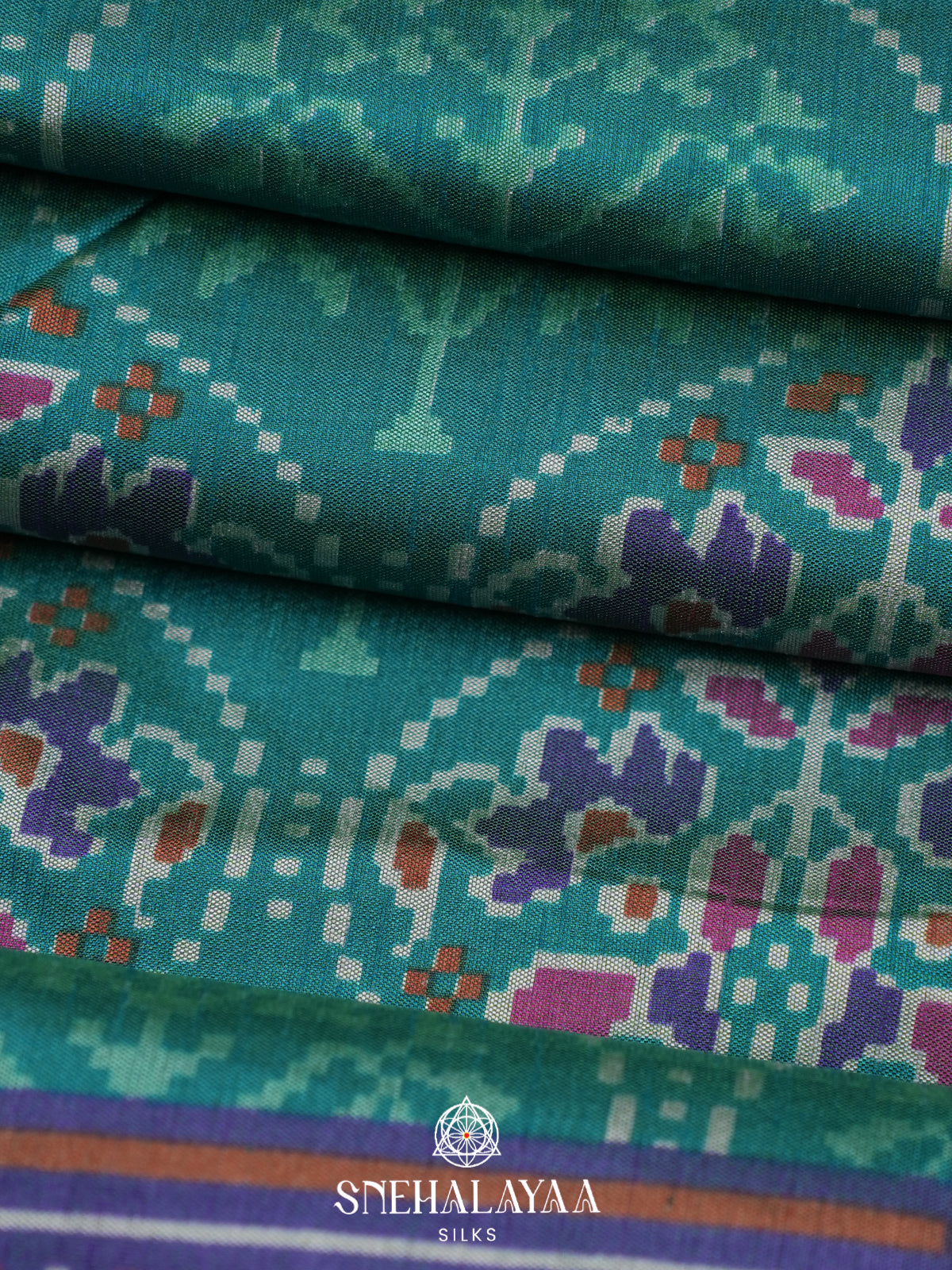 Teal Green Ikkat Saree