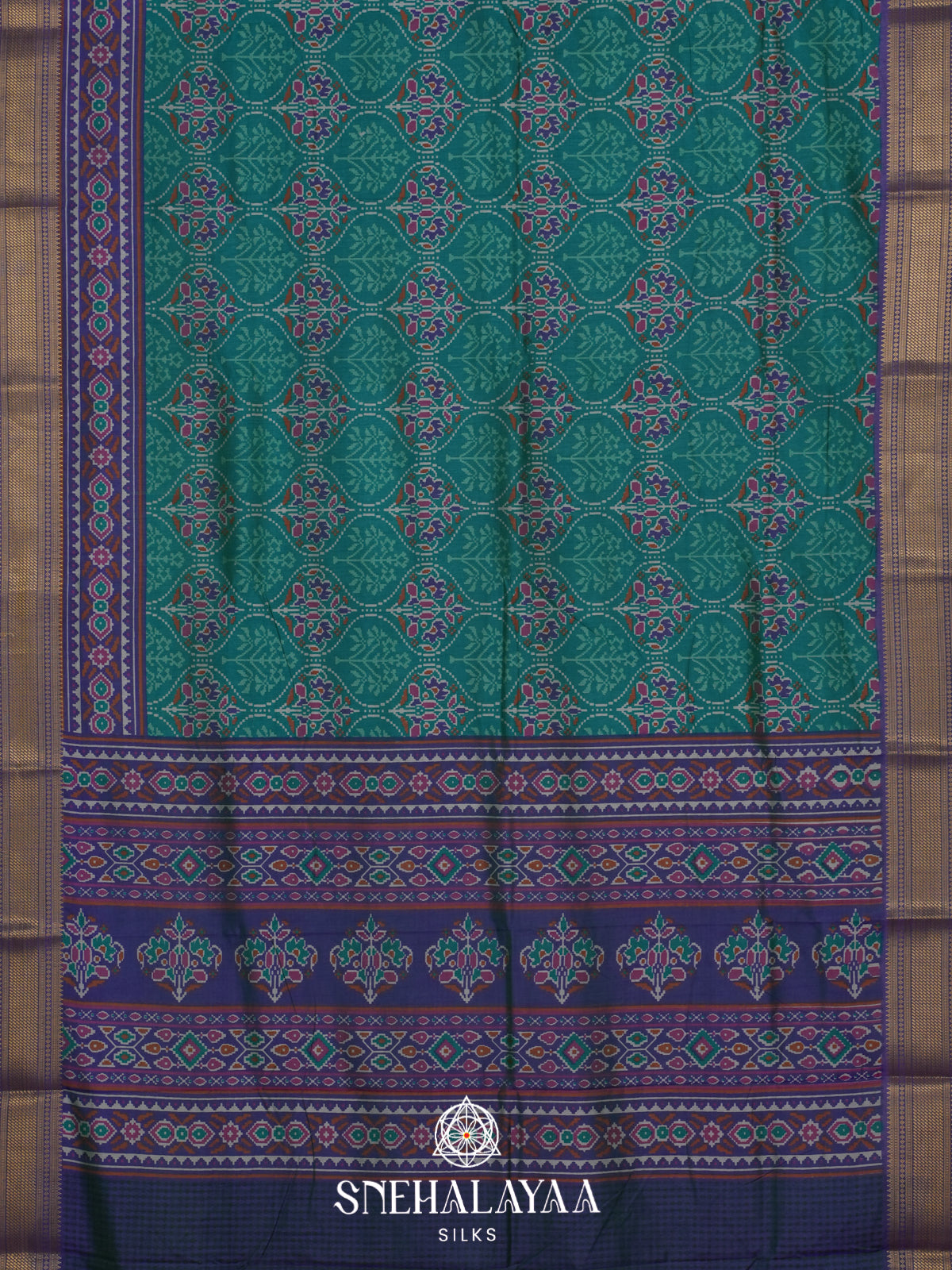 Teal Green Ikkat Saree