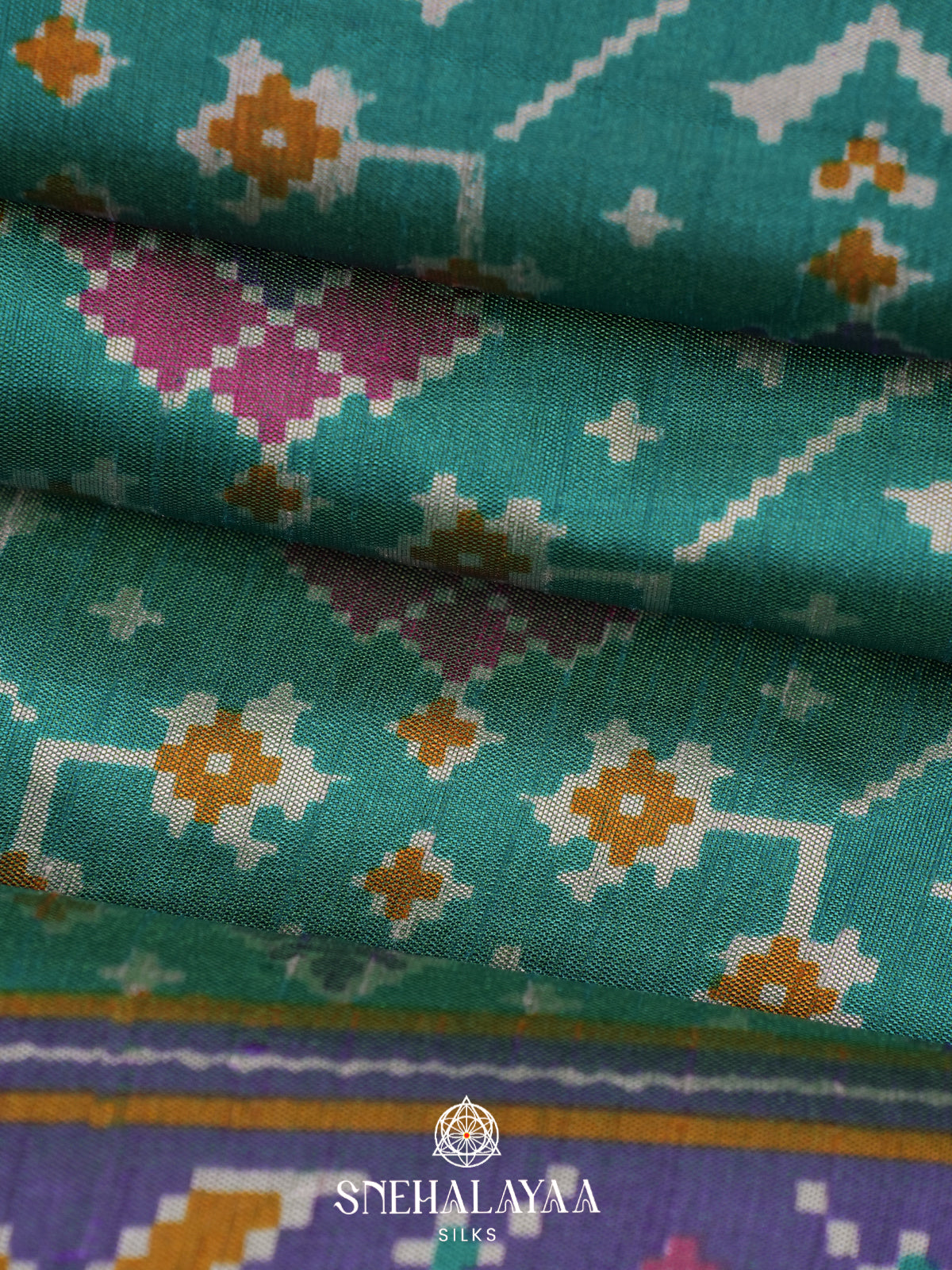 Teal Green Ikkat Saree