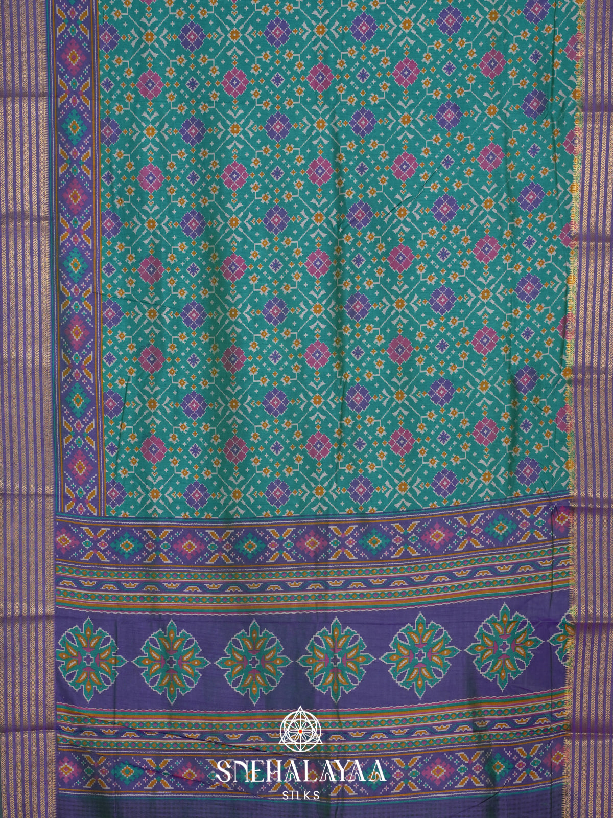 Teal Green Ikkat Saree