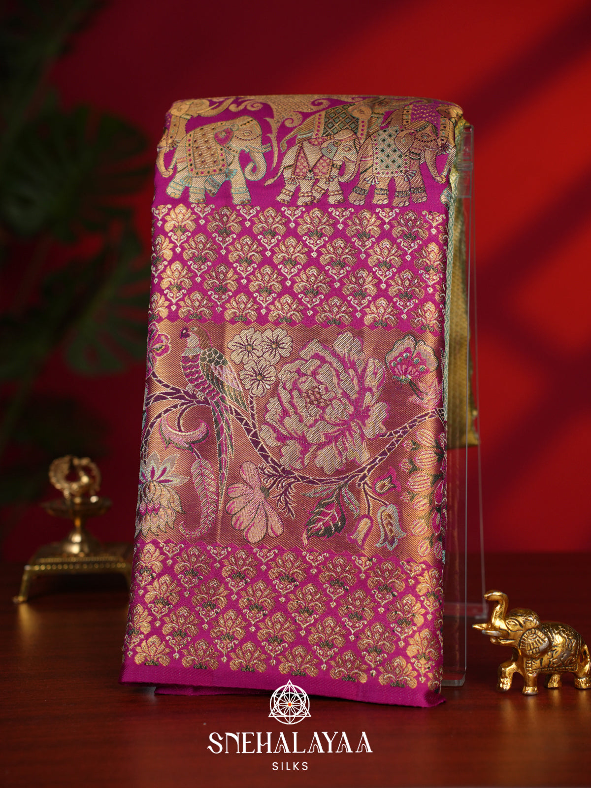Sage Green Kanjivaram Silk Saree with Magenta Floral and Elephant Zari Border