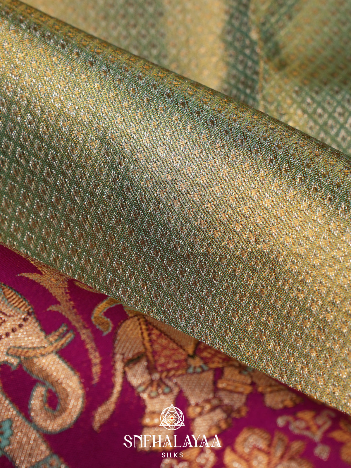 Sage Green Kanjivaram Silk Saree with Magenta Floral and Elephant Zari Border