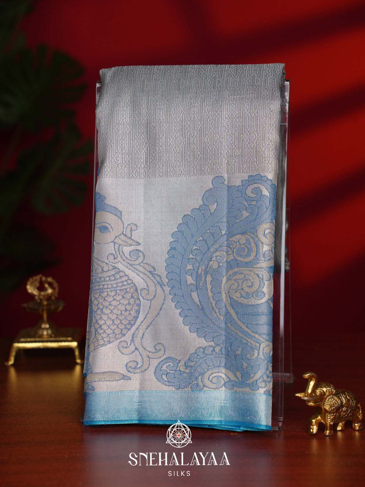 Silver Grey Kanjivaram Silk Saree with Blue Peacock Border