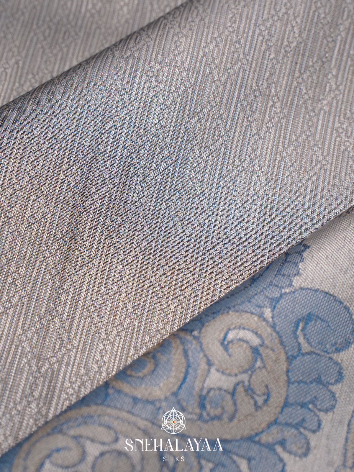 Silver Grey Kanjivaram Silk Saree with Blue Peacock Border