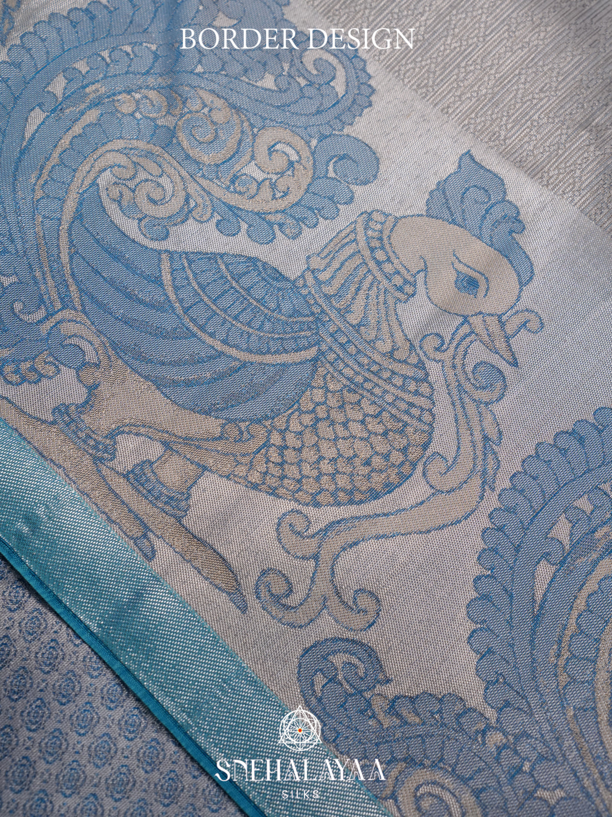 Silver Grey Kanjivaram Silk Saree with Blue Peacock Border