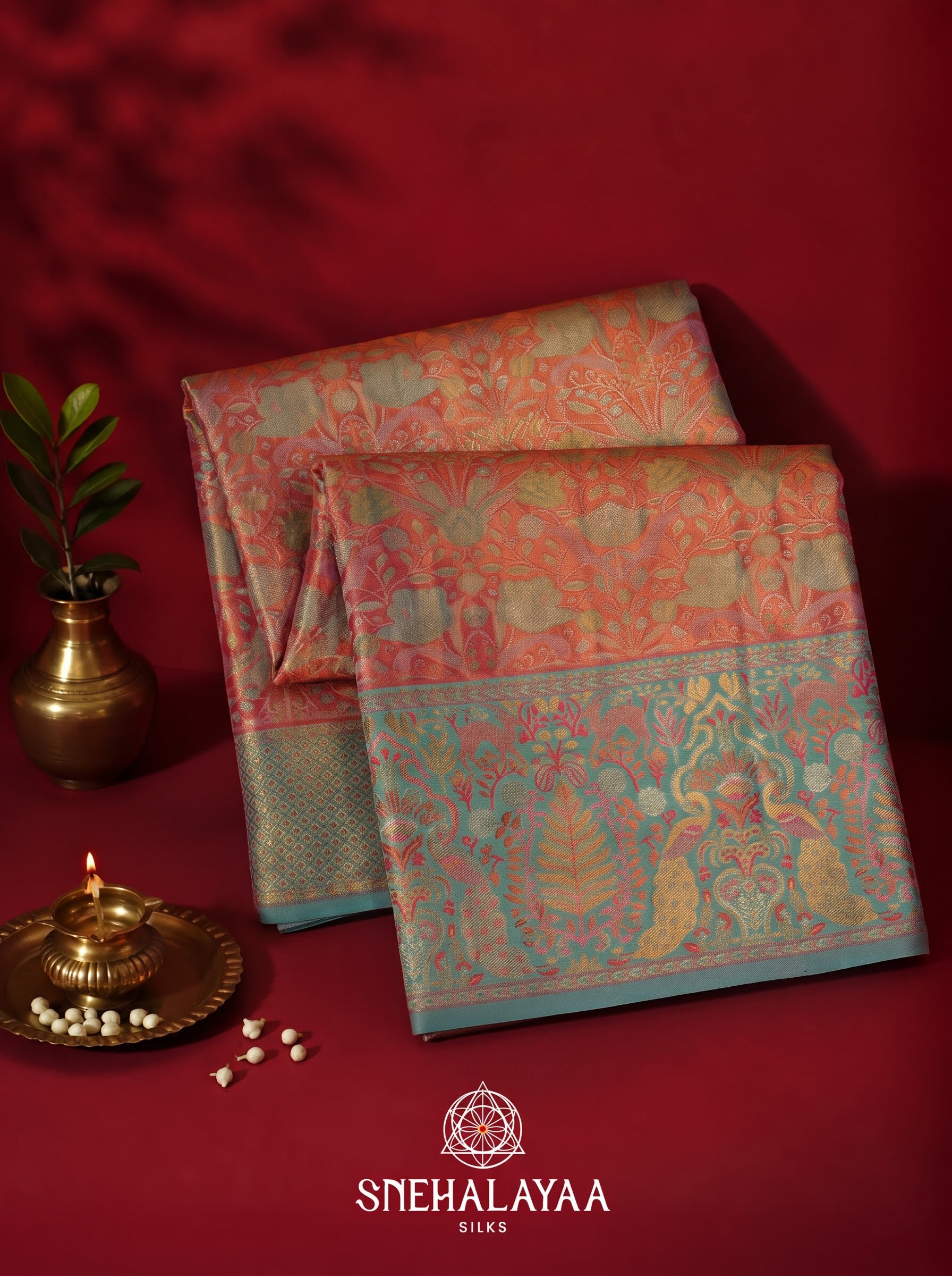 Coral Pink Kanjivaram Silk Saree with Floral Brocade and Aqua Blue Peacock Zari Border