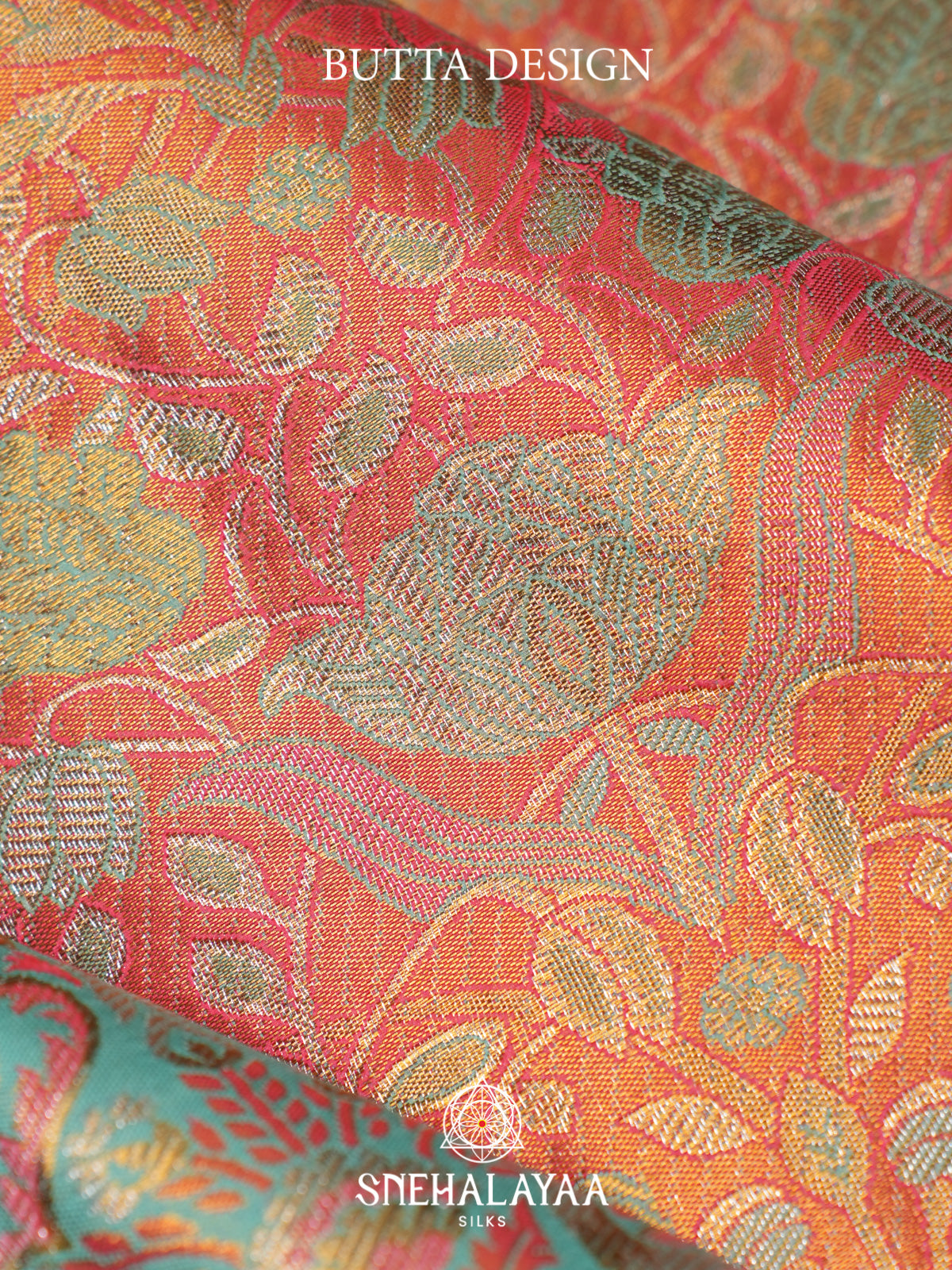 Coral Pink Kanjivaram Silk Saree with Floral Brocade and Aqua Blue Peacock Zari Border