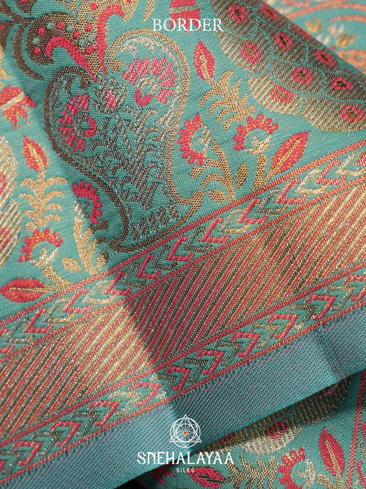 Coral Pink Kanjivaram Silk Saree with Floral Brocade and Aqua Blue Peacock Zari Border