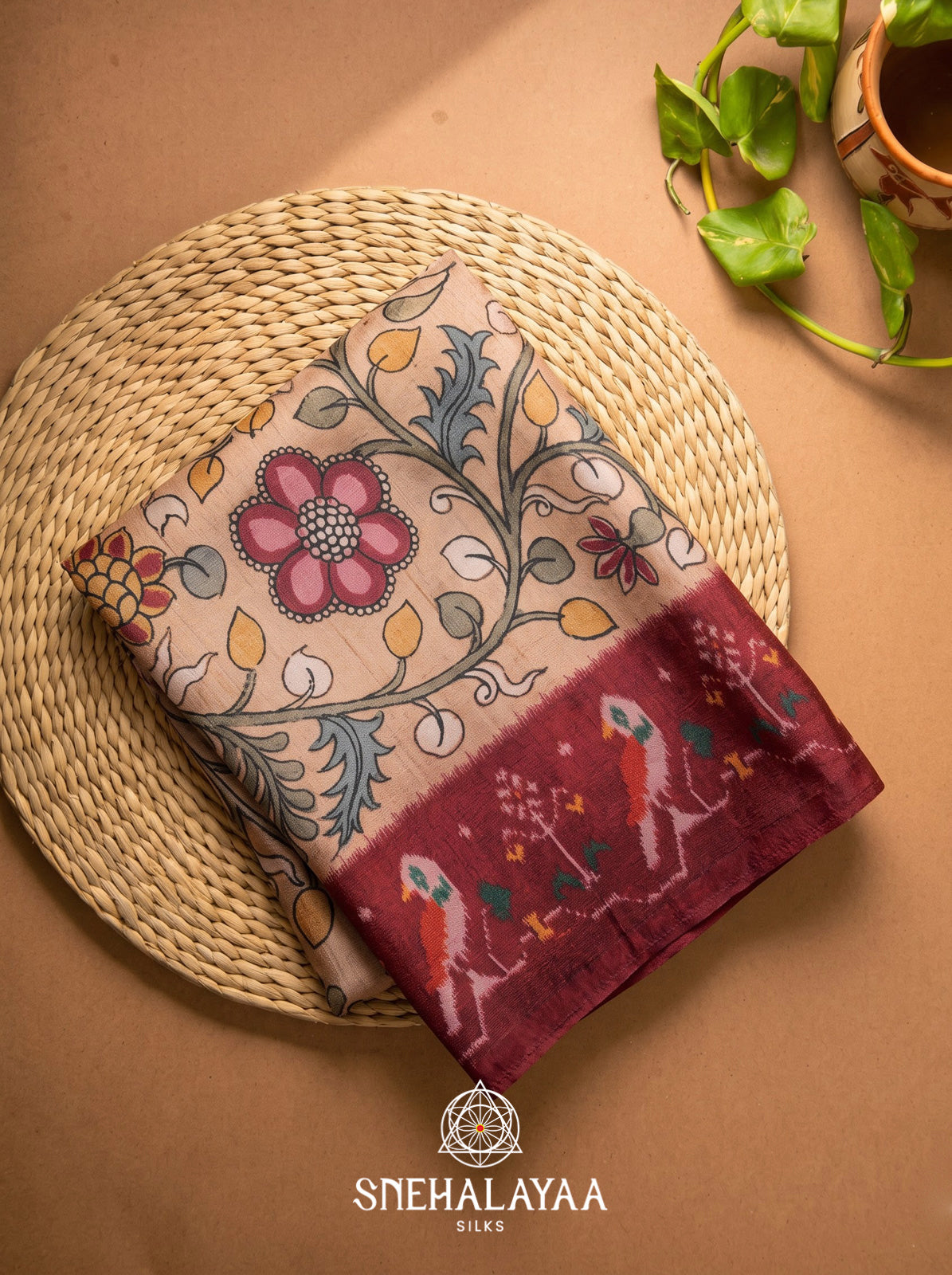Dusty Peach Floral Printed Tussar Silk Saree with Maroon Ikat Border