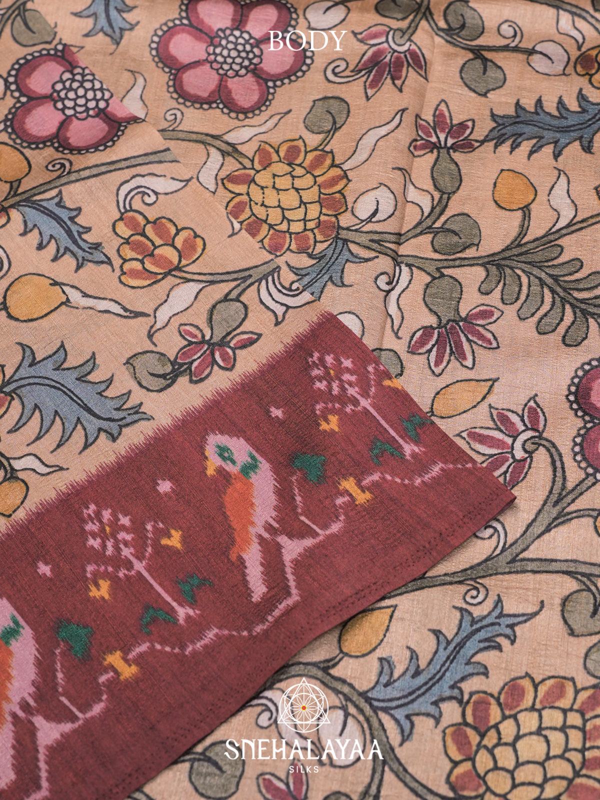 Dusty Peach Floral Printed Tussar Silk Saree with Maroon Ikat Border
