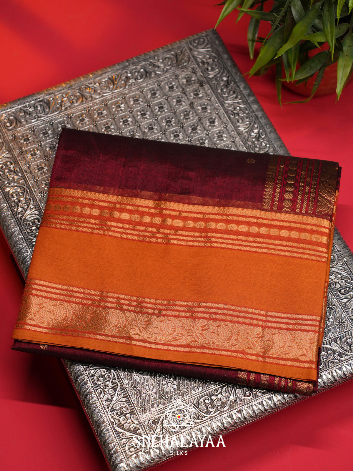 Maroon Silk Cotton Saree with Orange Gold Zari Border