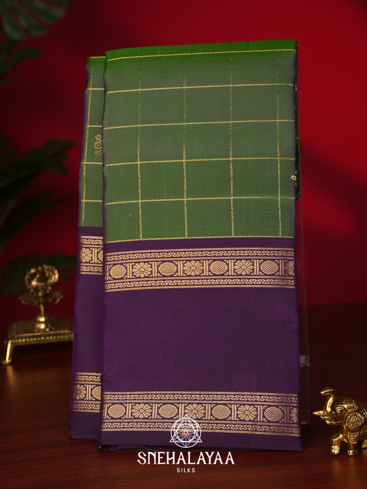 Green Kanjivaram Silk Saree with Purple Zari Border