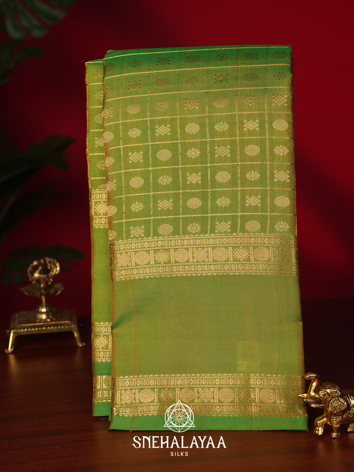 Green Kanjivaram Silk Saree with Gold Zari Checks and Buttas