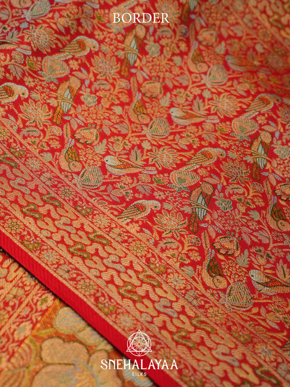Pastel Green Kanjivaram Silk Saree with Red Floral Bird Border