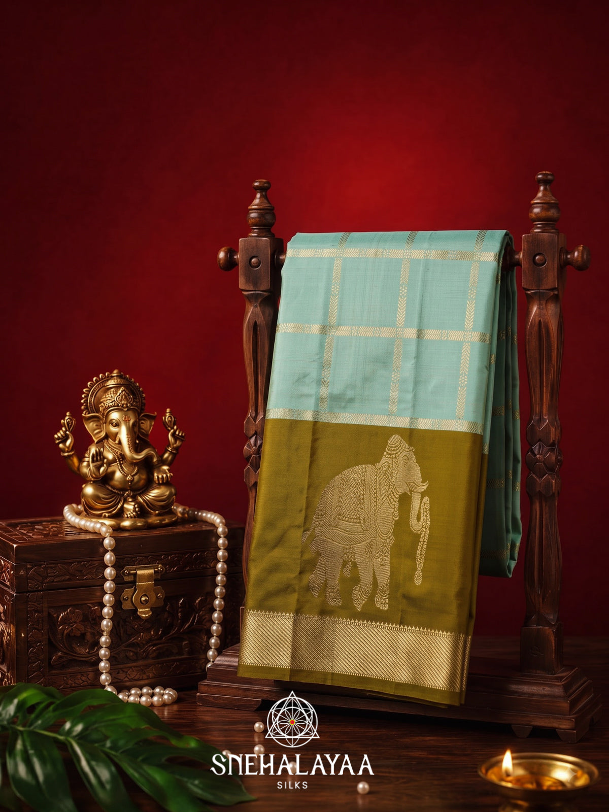 Sky Blue Kanjivaram Silk Saree with Olive Green Elephant Border