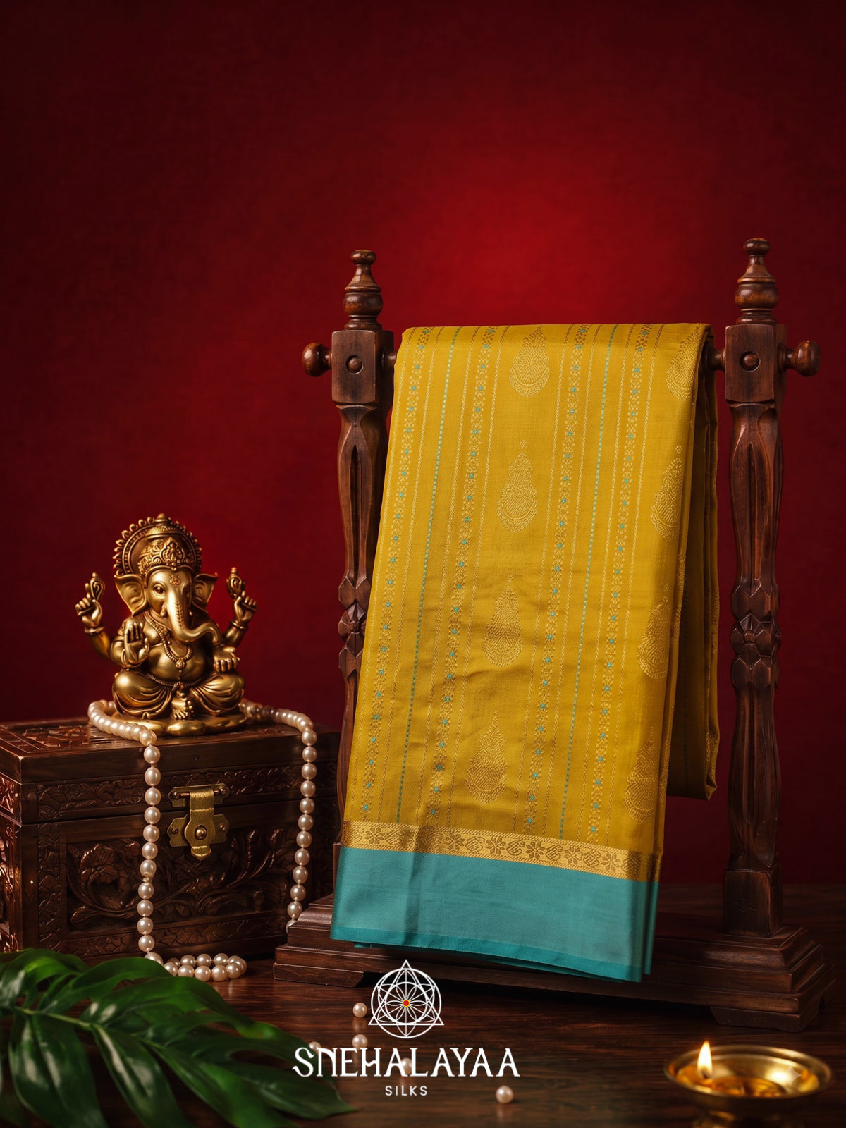 Mustard Yellow Kanjivaram Silk Saree with Turquoise Blue Border