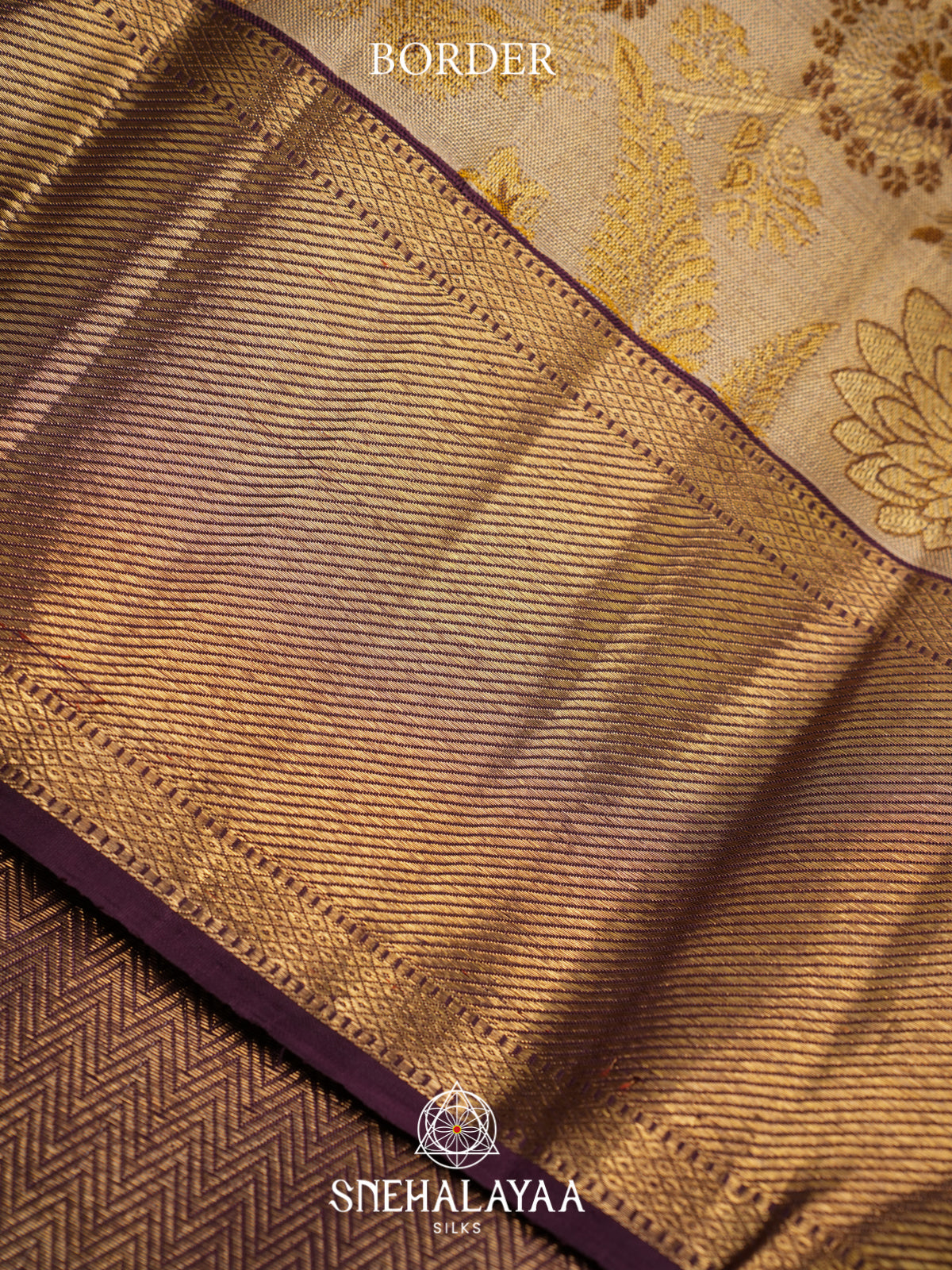 Cream Kanjivaram Silk Saree with Floral Zari Weaving and Purple Border