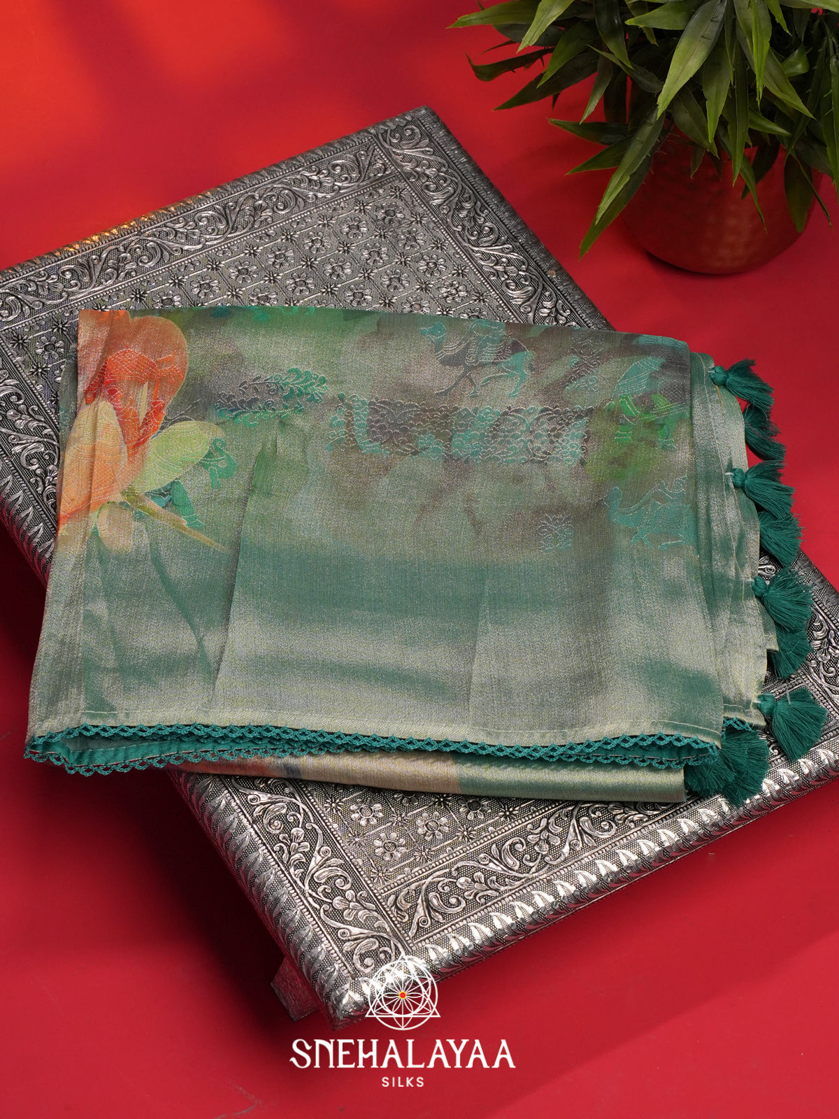 Teal Green Tissue Silk Saree