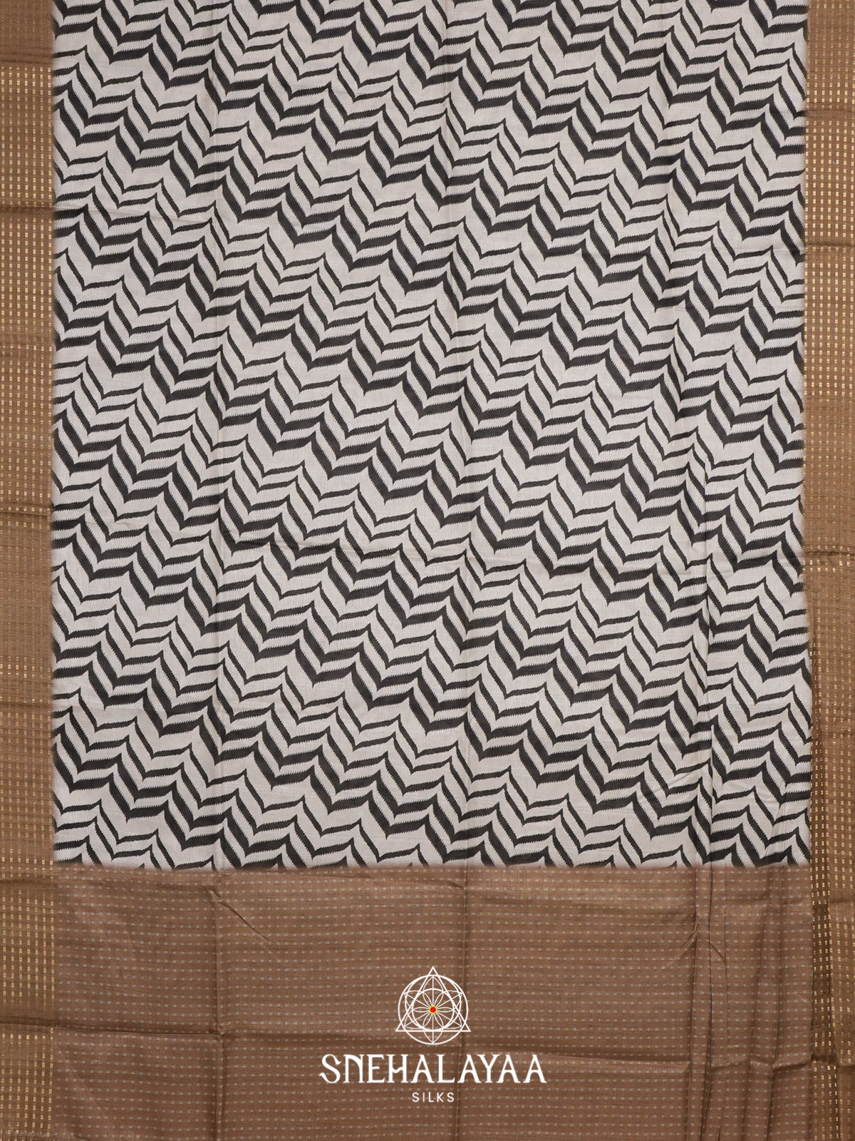 White with Brown  Tussar Saree