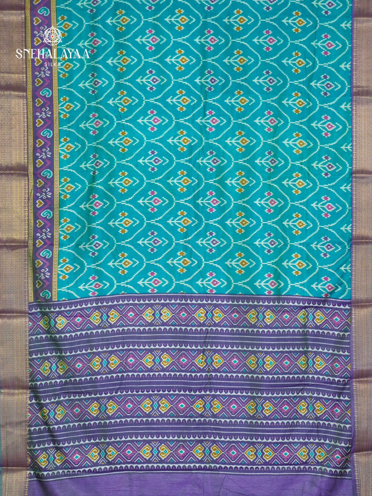 Teal Blue Ikat Saree