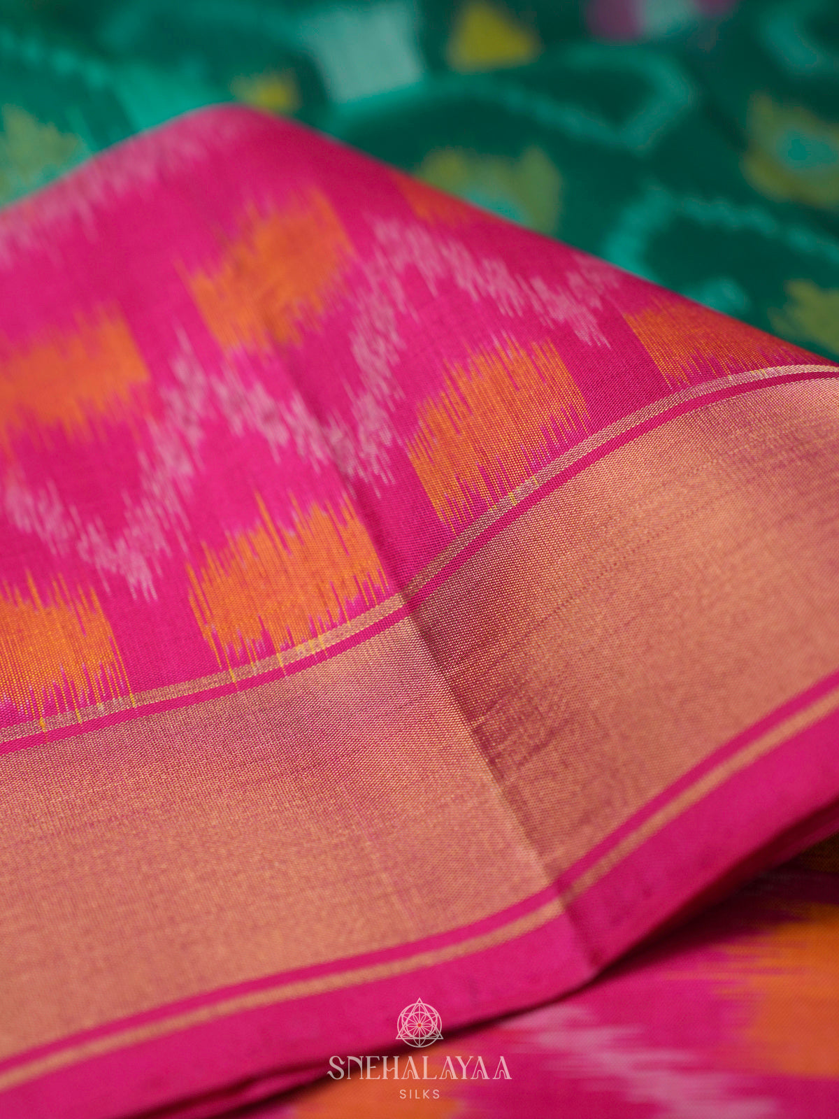 Teal Green Ikat Soft Silk Saree