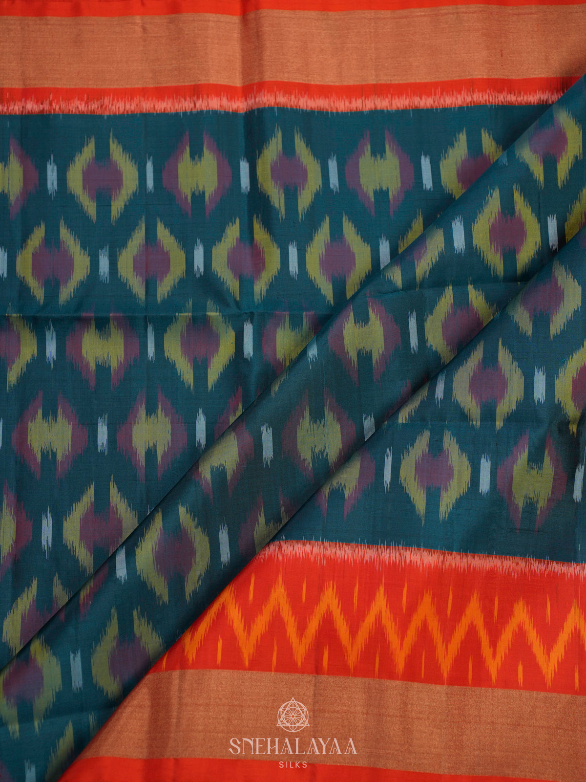 Peacock Blue Ikat Soft Silk Saree