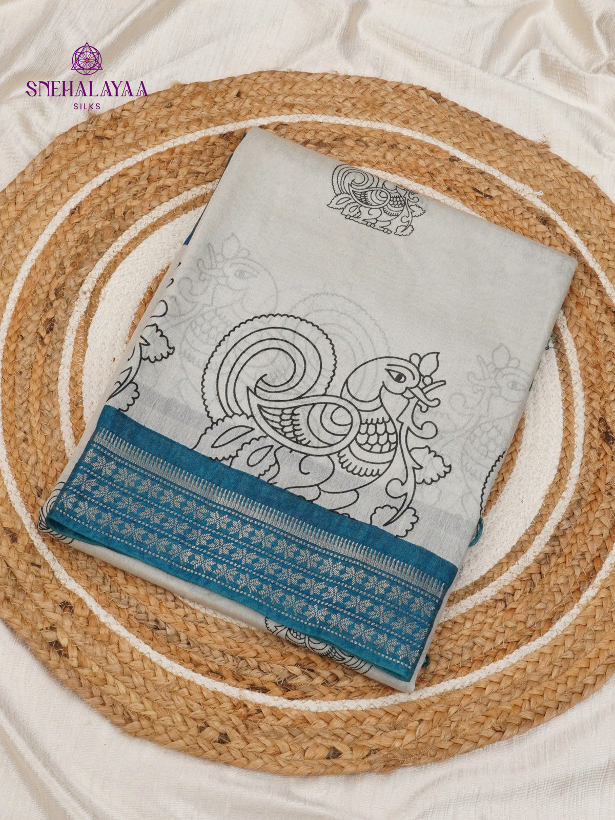 Light Grey Kalamkari Saree with Teal Blue Woven Border