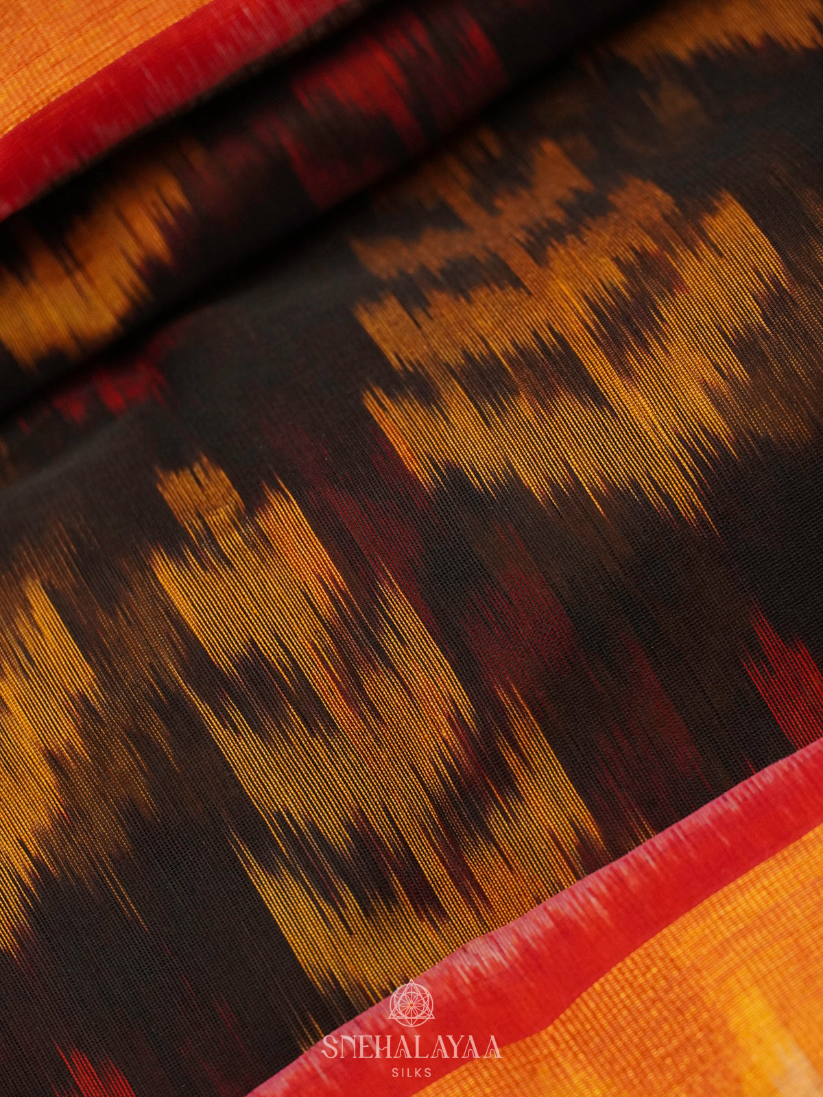 Black Ikat Silk Cotton Saree with Traditional Woven Border