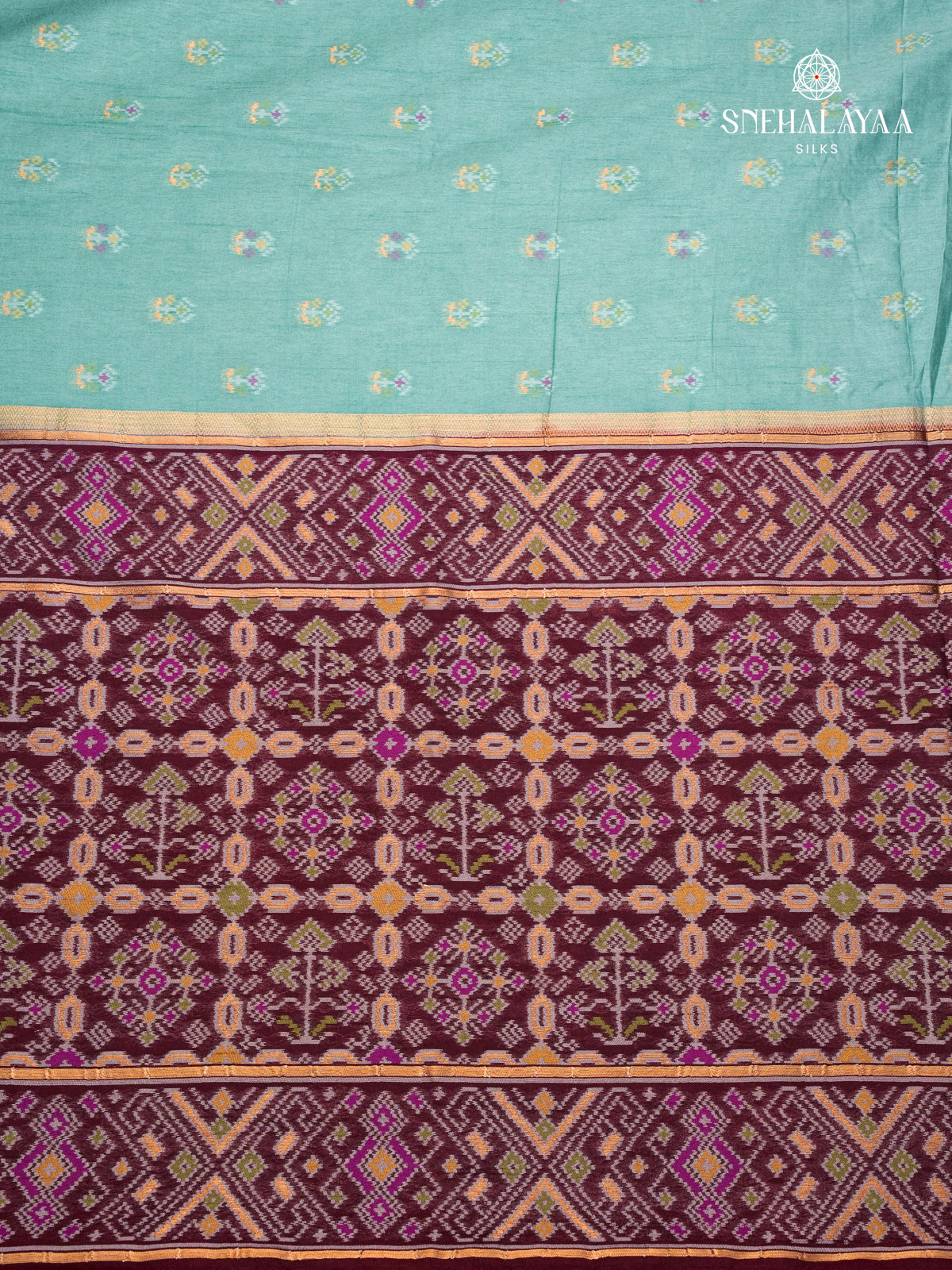 Teal Blue Ikat Silk Saree